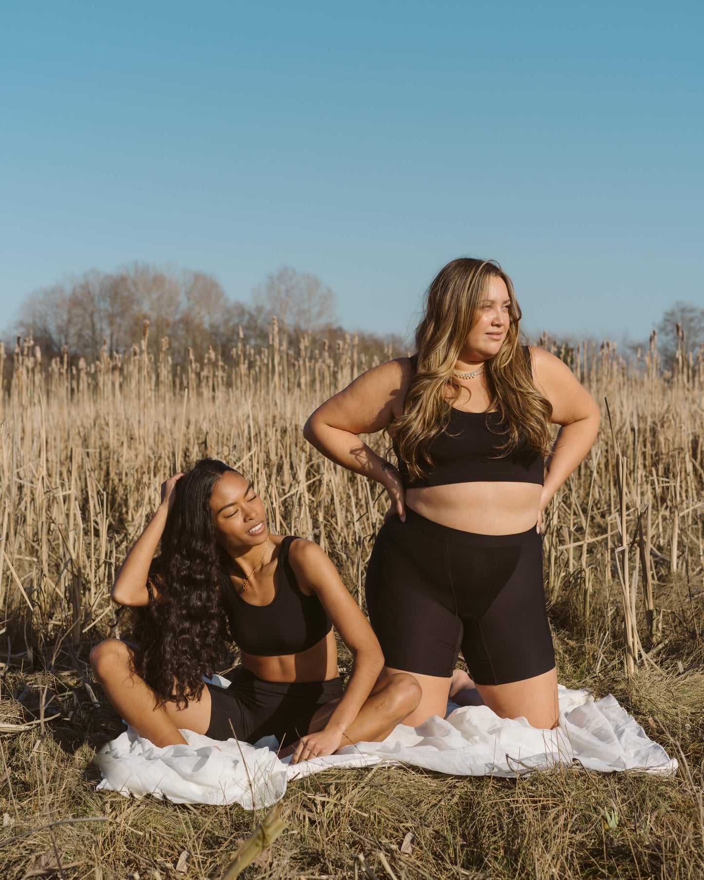 Black | Model is wearing size XS (left) and size 2XL Sporty Bralette and 2XL Long Boxer (right)