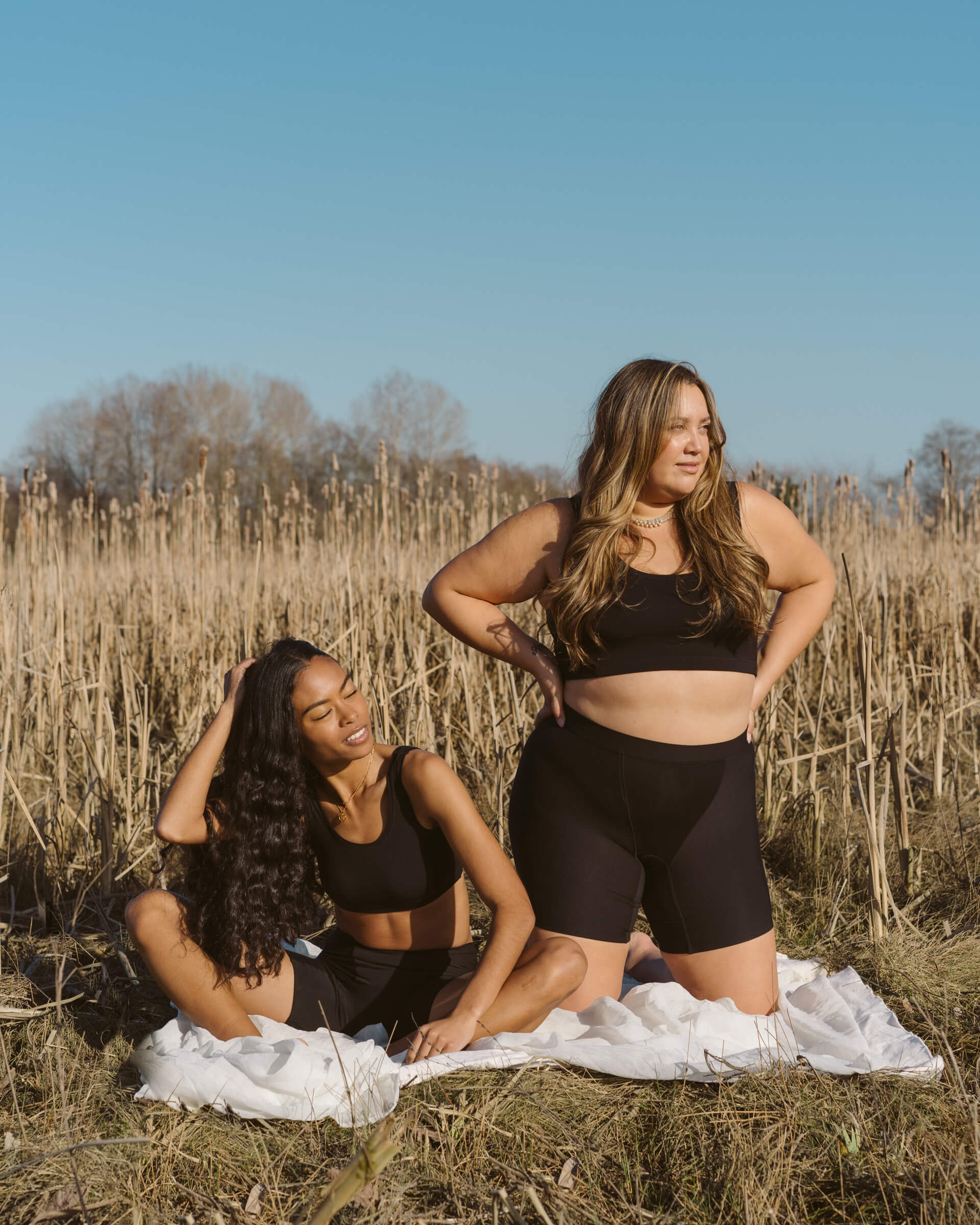 Black | Model is wearing size XS (left) and size 2XL Sporty Bralette and 2XL Long Boxer (right)